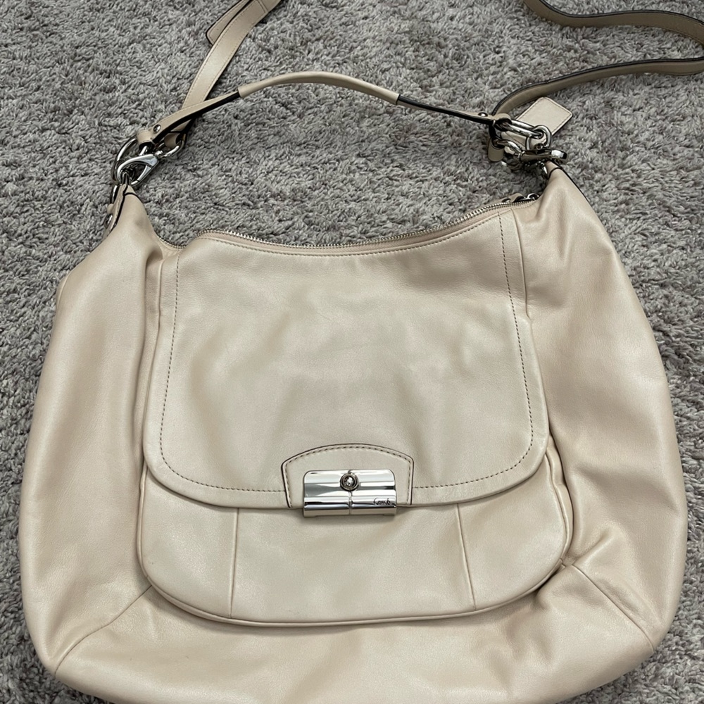 Cream coach crossbody bag